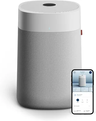 Blueair Blue Pure 211+ air purifier in a large living room